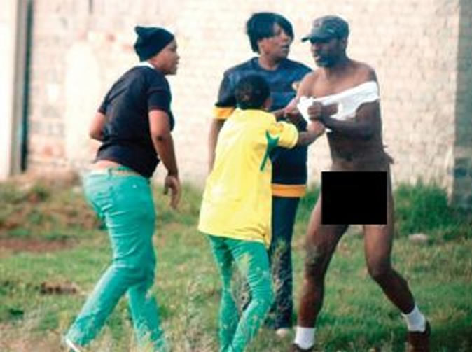 Drunk man stripped of his clothes by angry women