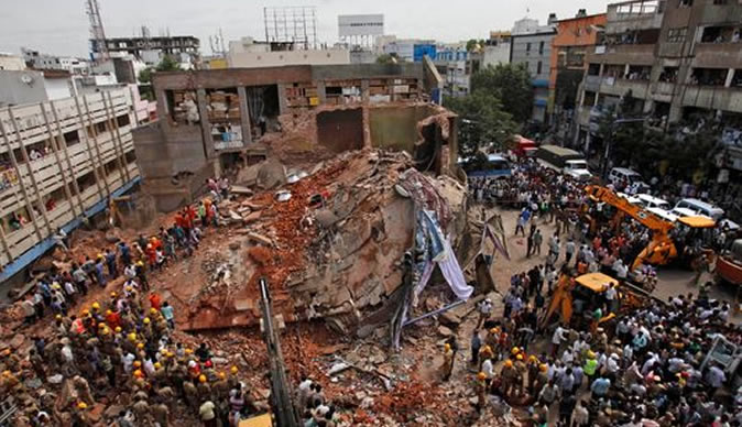 Building collapses in India, kills at least 12 