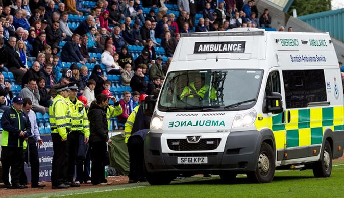 Fan who collapsed during football match dies