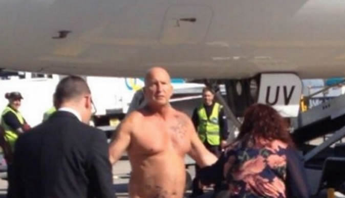 Passenger takes clothes off and challenges pilot to fist fight