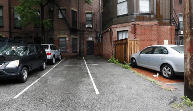 Woman buys parking spots for more than US $500 000