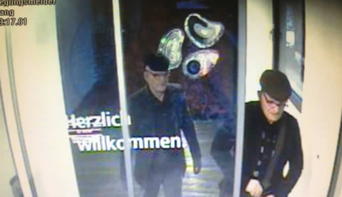 Armed robbers disguised as twin pensioners raid bank
