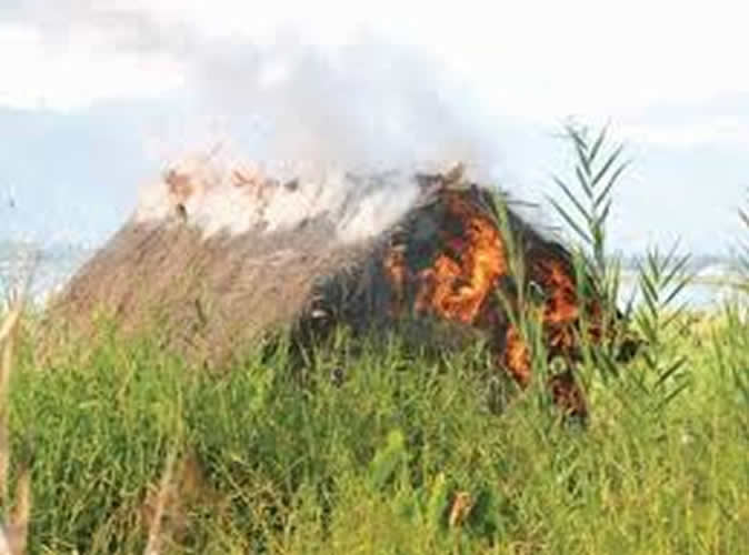 Man sets wife's lover's hut on fire