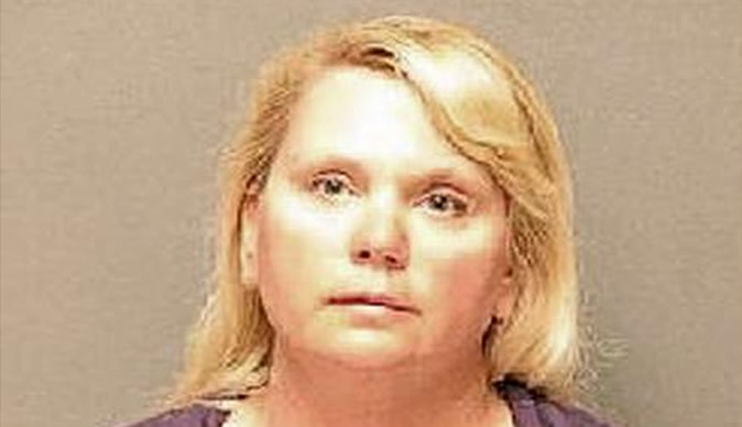 Teacher arrested for sleeping with family dog